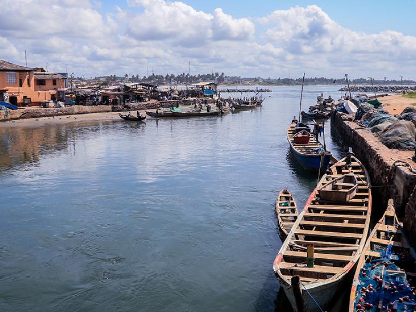 Stroll along the portside of Elmina, a town known for its fishing and trade