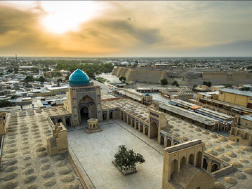 Make a stop along the Silk Road trade at Bukhara, known for bazaars, madrassas, and mosques