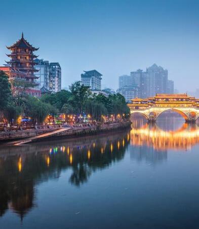 river with bridge and pagoda in background