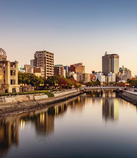 Panorama of Hiroshima Cityscape at Twilight. View over the Ota River, Atomic Bomb Dome illuminated on the left side of the river