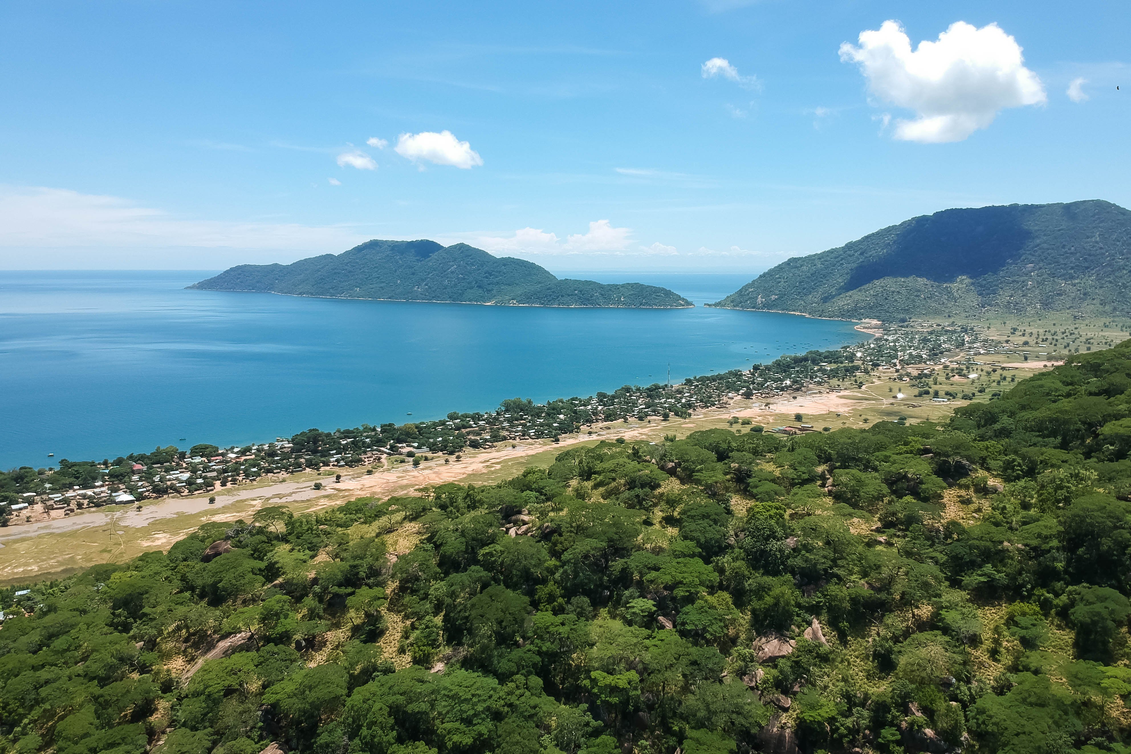 Kasankha bay with green mountains in the background in Cape Maclear, Malawi