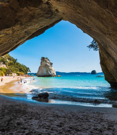 Stunning cove with view of white sand beach and blue waters on the other side