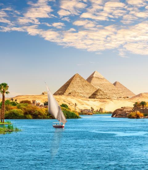 Beautiful Nile scenery with sailboat in the Nile on the way to pyramids