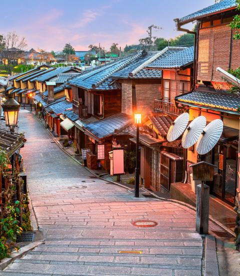 Traditional winding street in Gion, Kyoto, Japan at dawn