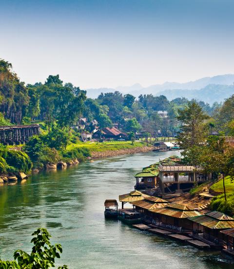 River winds between rural villages