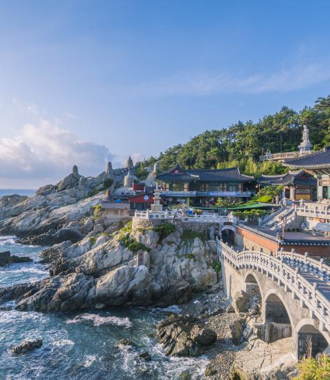 Haedong Yonggungsa Temple is situated on the edge of the rocky coast of the sea