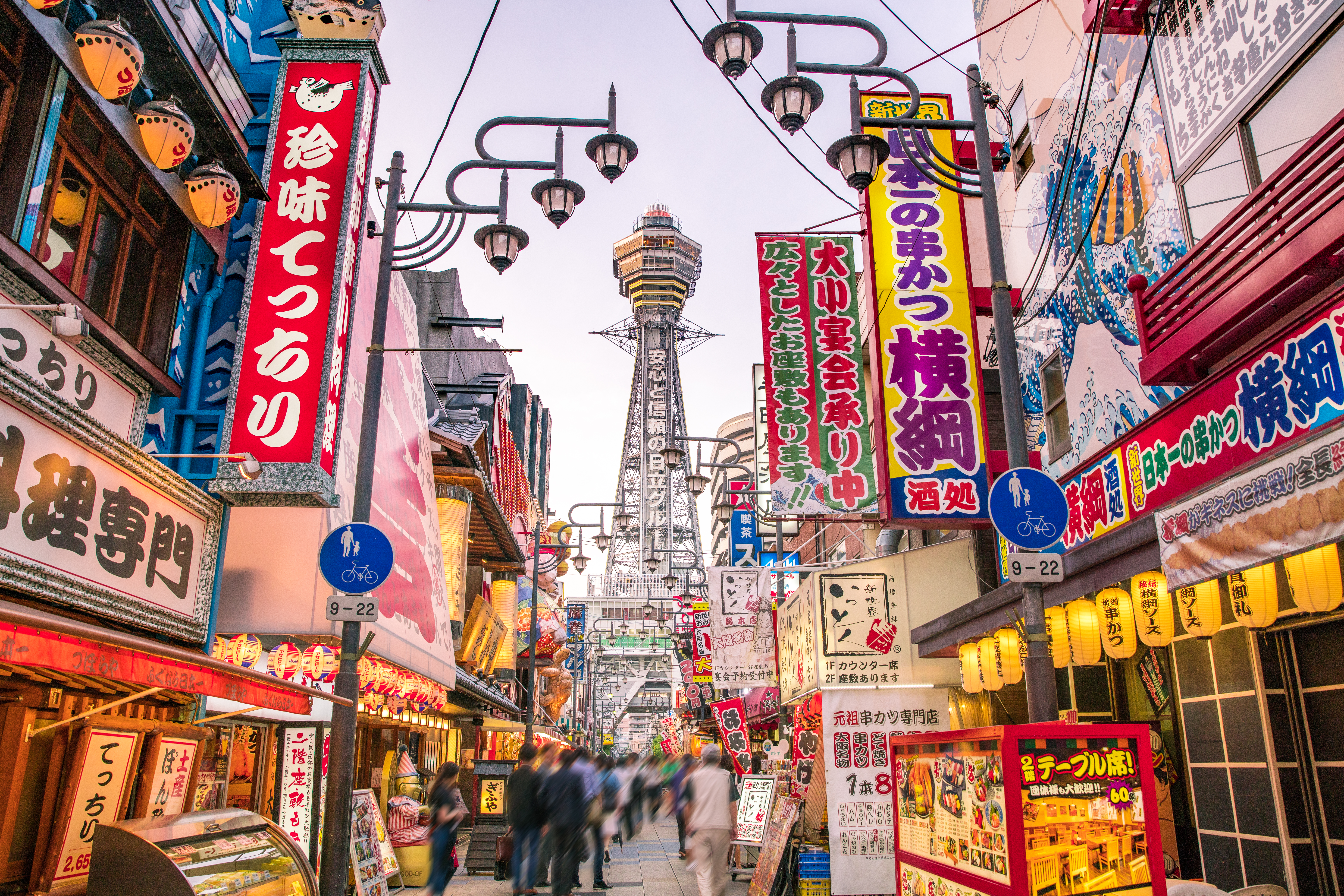 Osaka Tower and view of the neon advertisements Shinsekai district