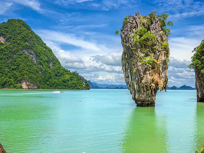 Take a winning shot at Phang Nga Bay, known for picturesque waters, sands, caverns, and rocks