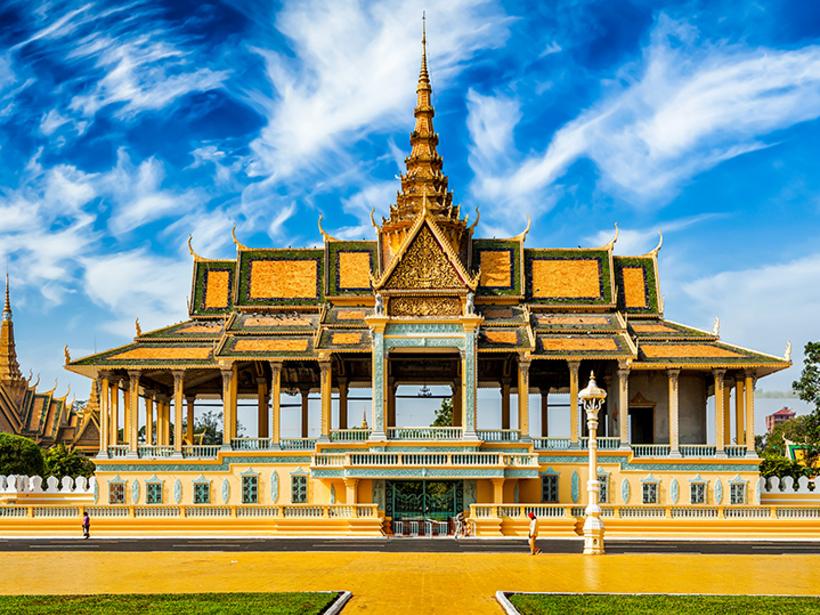 Admire the glistening gold of the Phnom Penh Royal Palace and its unique architecture