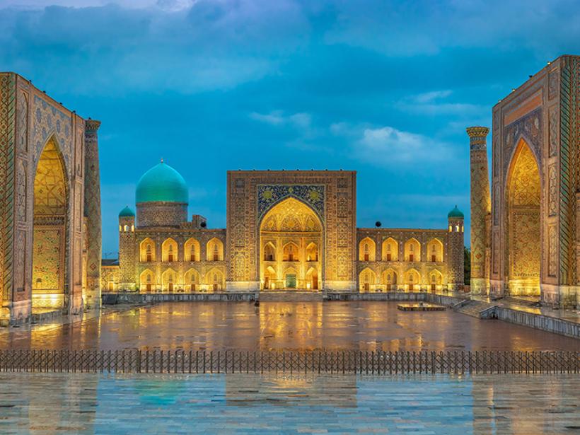 Walk through the stunning Registan square in the ancient city of Samarkand