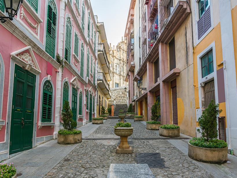 Admire the colourful streets of Macau as you wander and explore the area