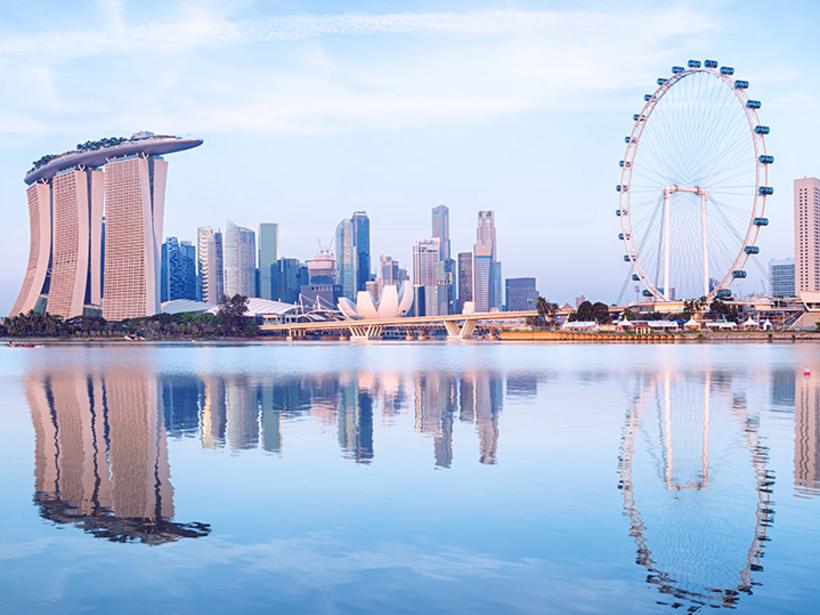 Admire the stunning Singapore skyline featuring the infamous Singapore Flyer
