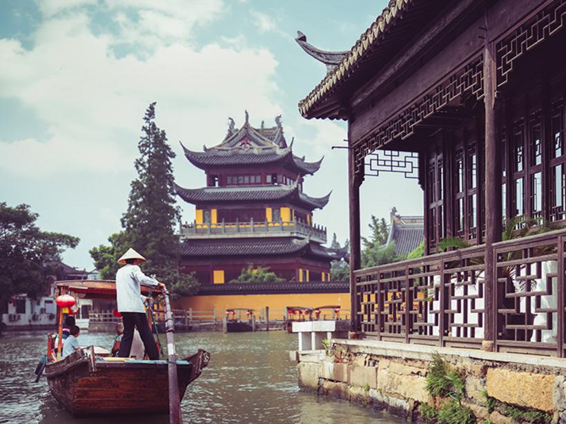 Leave land behind when visiting the water town of Shanghai Zhujiajiao outside of Shanghai